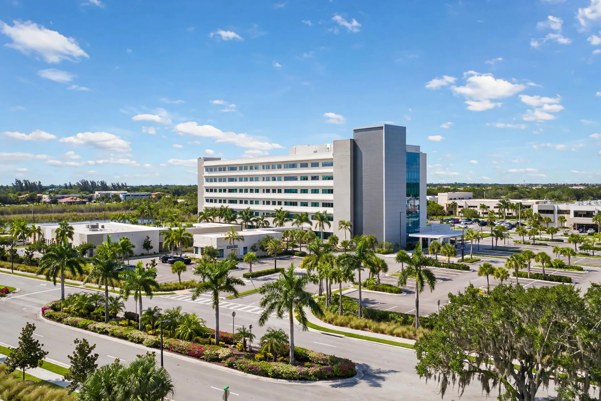 Community hospital exterior with palm trees in Coral Springs, Florida — Rafferty Domnick Cunningham & Yaffa